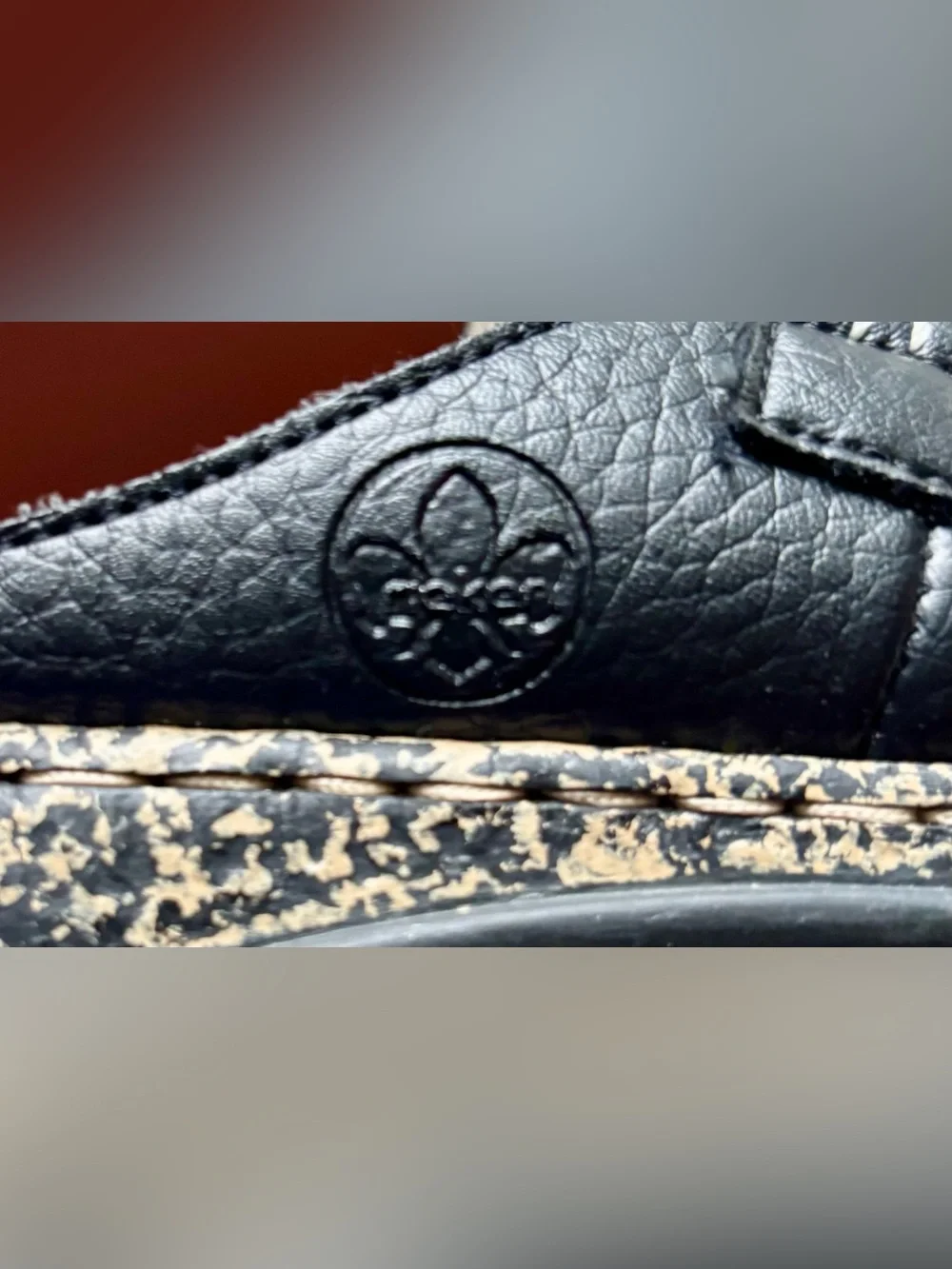 Rieker Black Slip-On Mule Loafers with Patterned Midsole